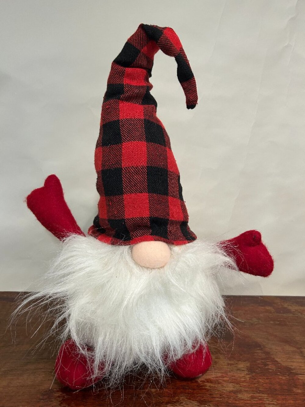Christmas Holiday Gnome with black and red buffalo plaid cap and wispy white bea